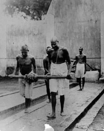 Jamnalal Bajaj as a C Class prisoner, drawing water from the jail well. He was arrested for his involvement in the Civil Disobedience Movement and sentenced to two years in prison.